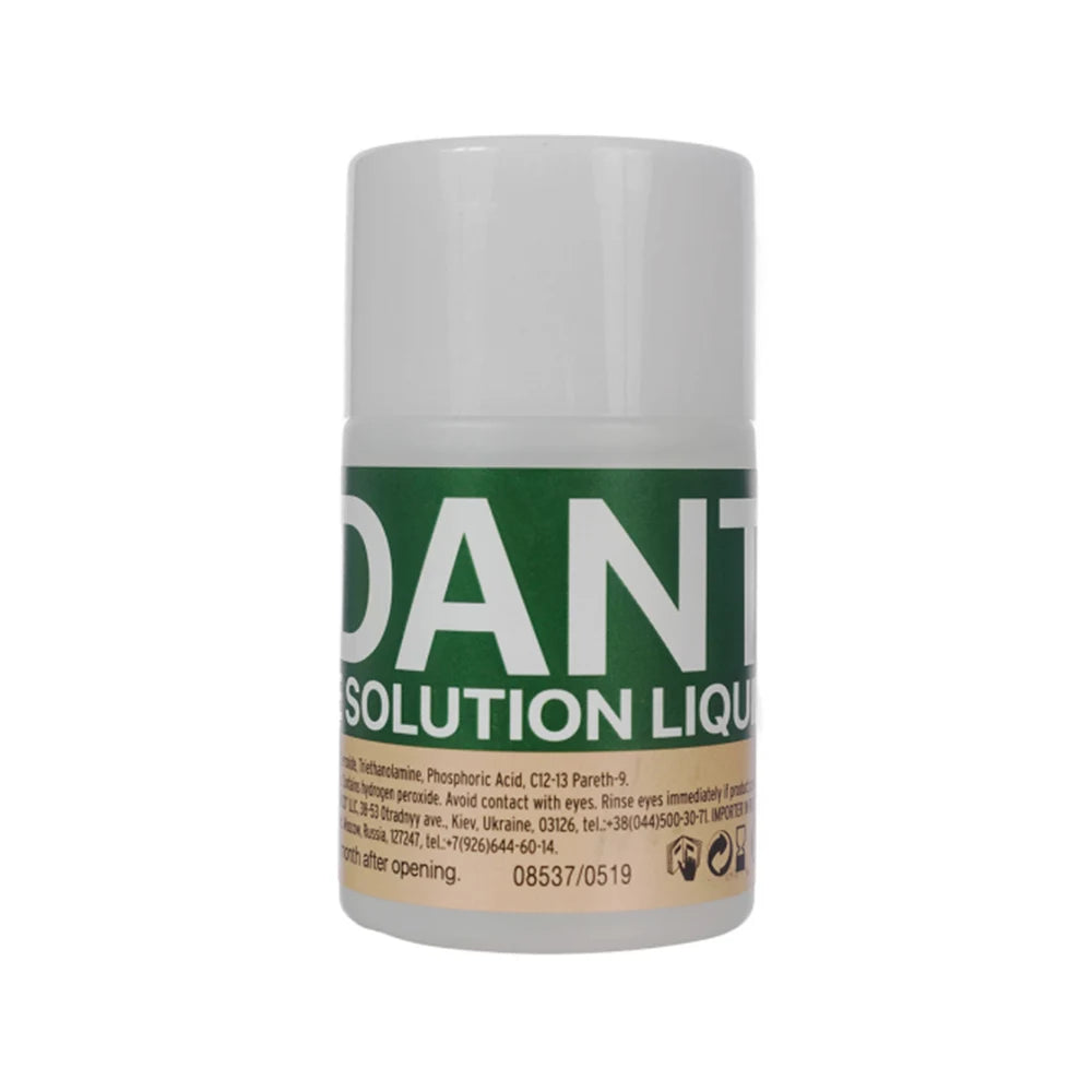 Bottle of Dant solution liquid on a white background