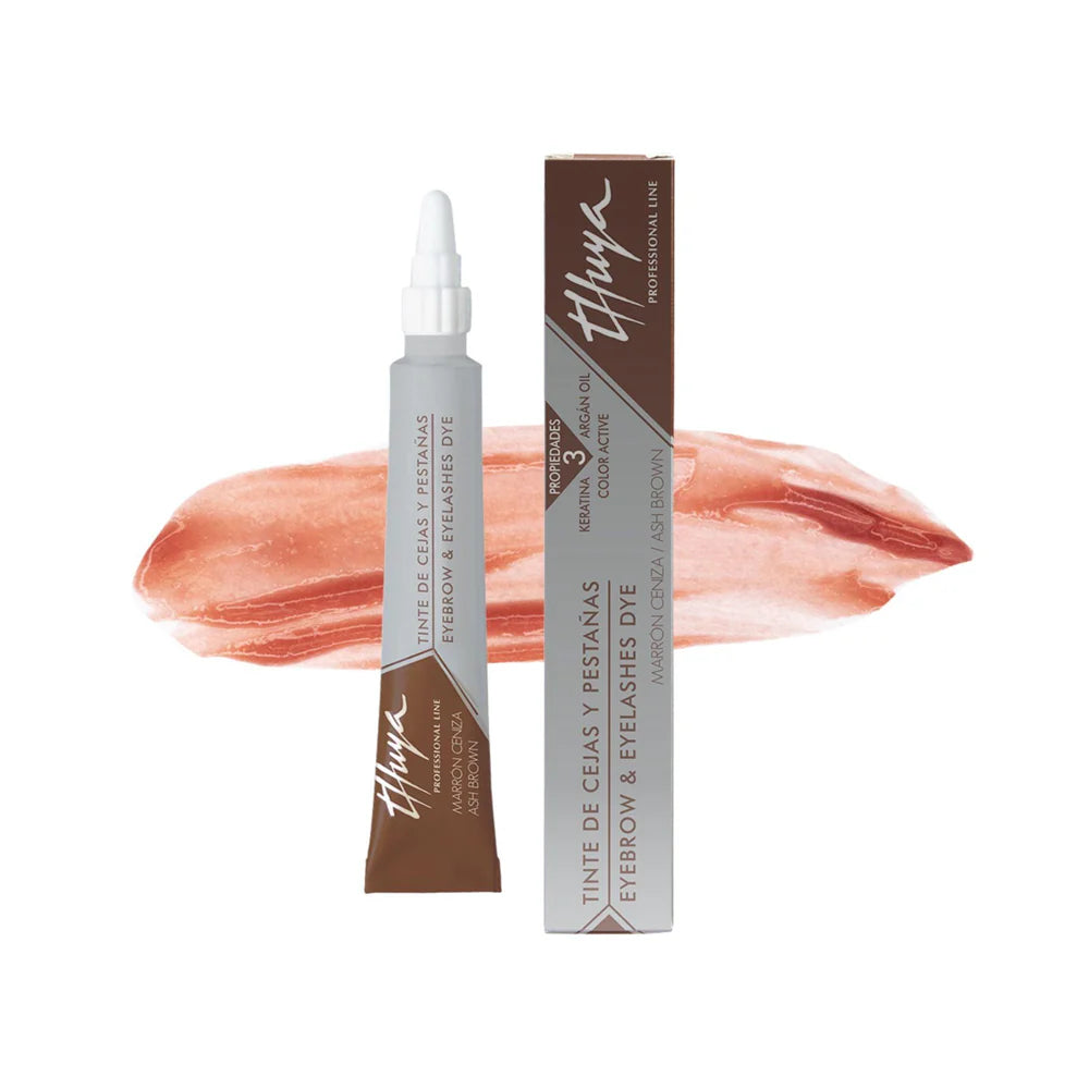 Eyebrow and eyelashes dye with applicator and packaging on a white background